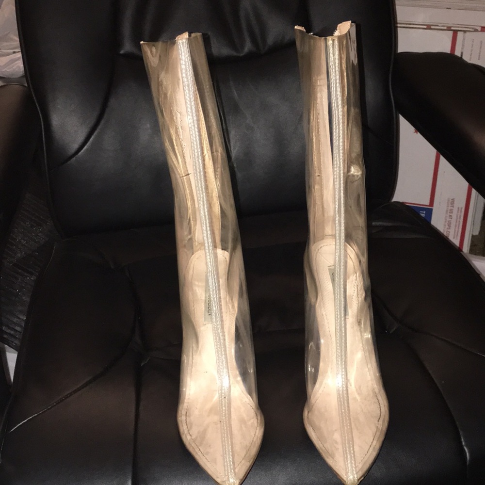 Transparent boots that comes below the knees